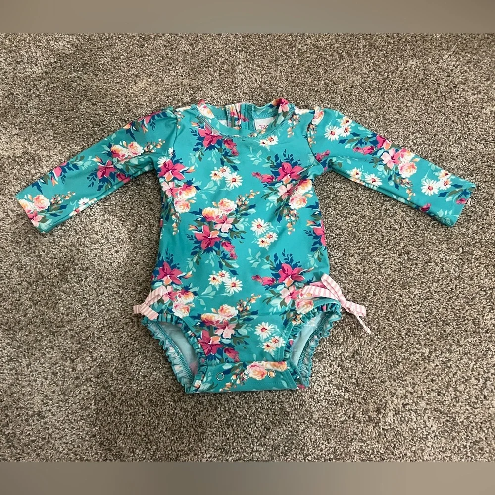 Worn once! Ruffle butts 6-12 month swimsuit